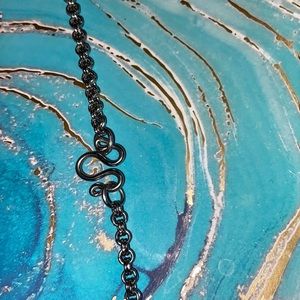 25” silver toned #10 necklace